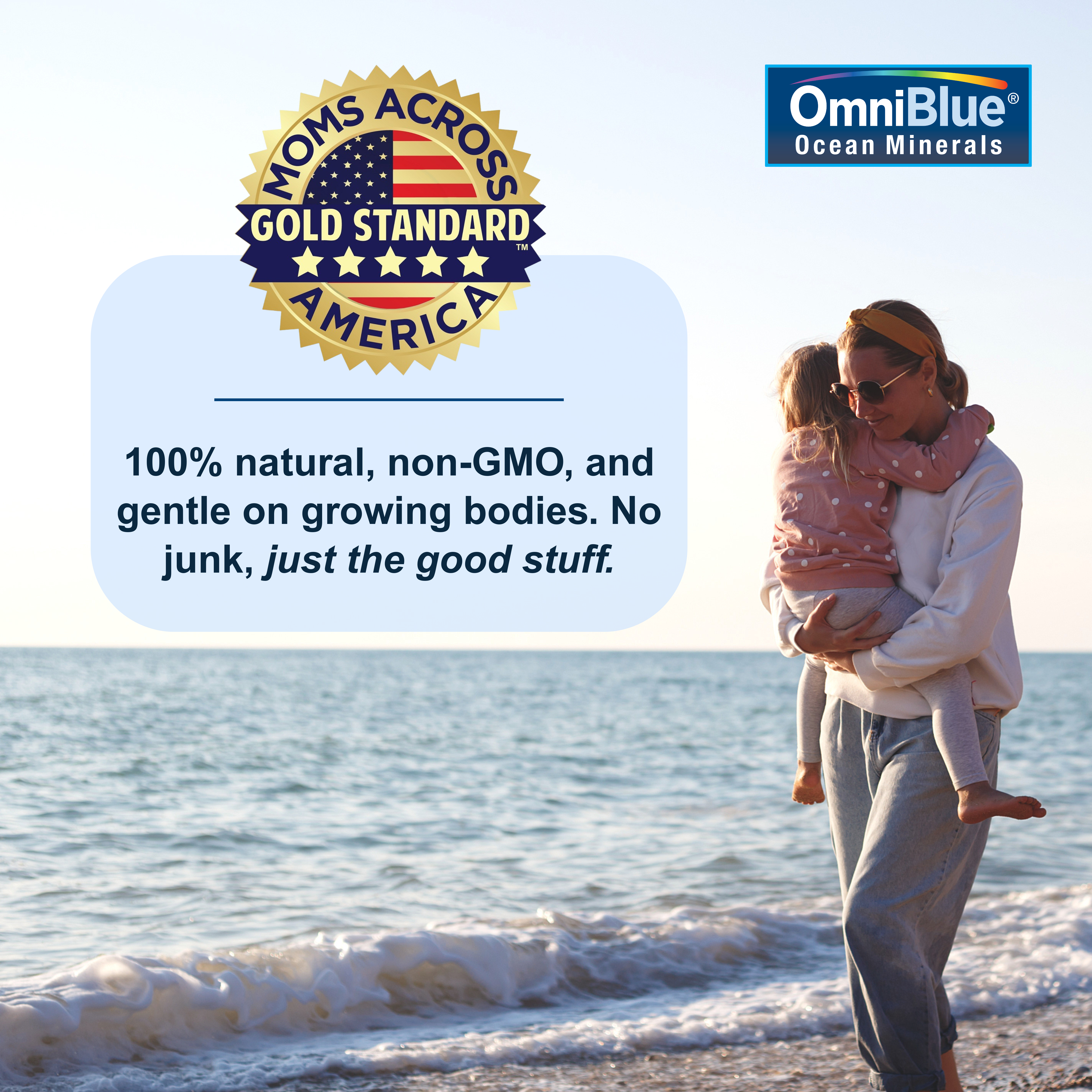 Woman holding a child on a beach with text about natural and non-GMO products, and OmniBlue logo.